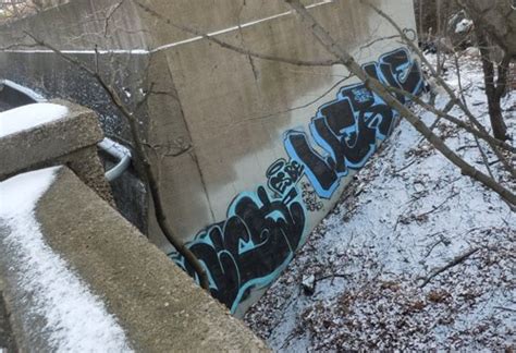 Impossible or hard to read or decipher because of poor handwriting, faded print, etc.: Dislocations: Meaning Graffiti