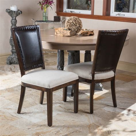 On sale for $279.00 original price $379.00 $ 279.00 $379.00. Amari Brown Leather Beige Fabric Dining Chairs (Set of 2 ...