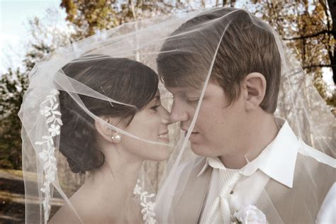 An Under The Veil Shot Between Bride And Groom Makes For A Very Sweet