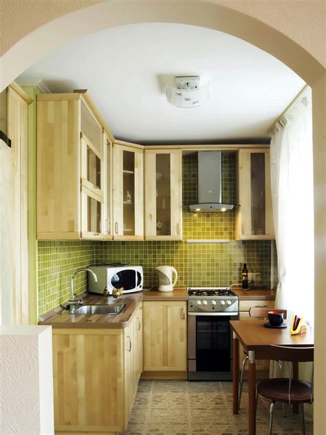 Downsized Appliances Light Wood Cabinetry And A Large Open Window