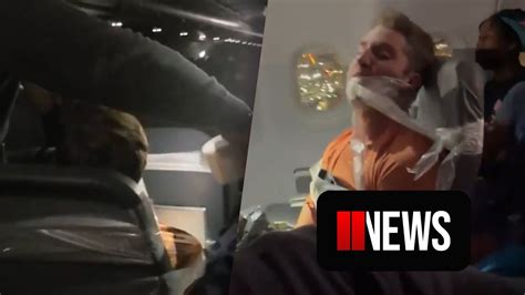Plane Passenger Duct Taped To Chair On Flight Youtube