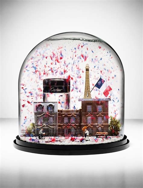 A Snow Globe With An Image Of The Eiffel Tower In Paris On It