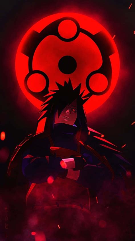Download Madara Uchiha From Naruto Handles A Rising Power Wallpaper