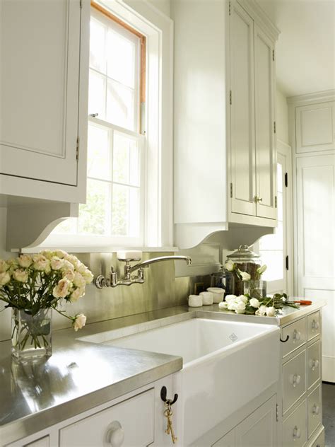 These handcrafted sinks bring beautifully affordable options to the heart of your home. White Kitchen Cabinets with Stainless Steel Countertops ...