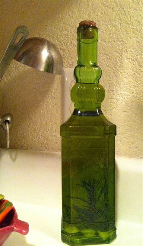 Attach corks all over a straw wreath using hot glue. Vintage Cork Bottle Olive Oil Rosemary & Garlic kitchen ...