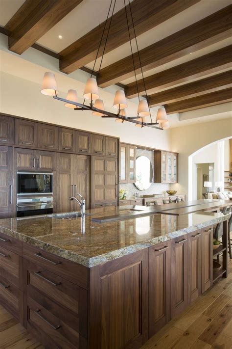 Transitional Kitchen Features High Ceilings With Exposed Beams Fully Custom Natural Walnut