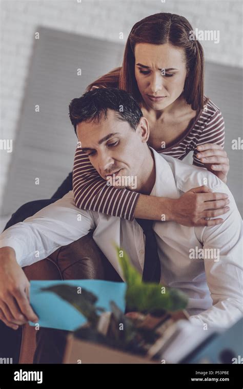 Nice Young Woman Caring About Her Husband Stock Photo Alamy