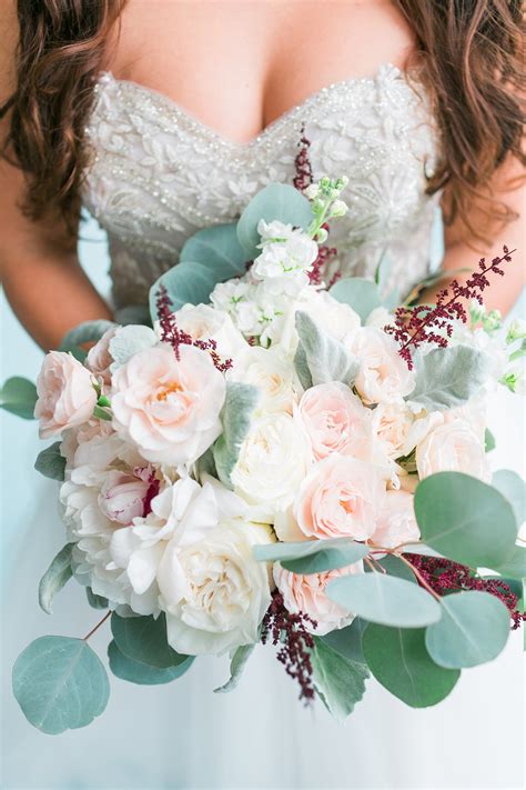 Spring wedding bouquet with white flowers. Austin Wedding | The Oasis Lake Travis | Succulent Blush ...