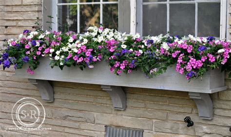10 Charming Ways To Add Window Box Planters To Your House
