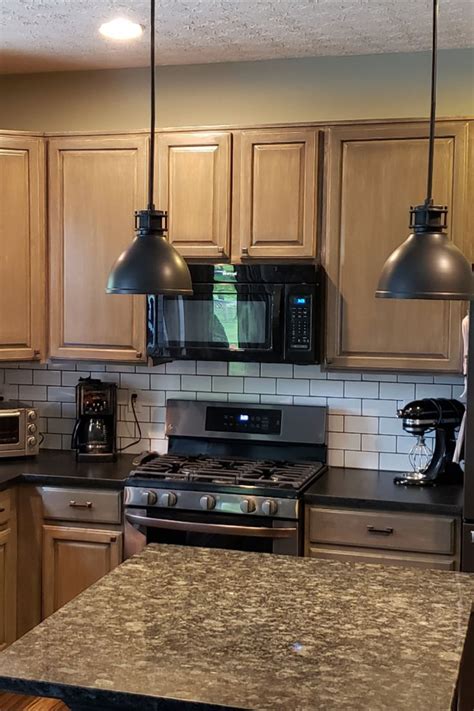 These refinished cabinets (as well as all the refinishes presented here) have adhered strictly to the after: Maple Cabinet refinish using General Finishes Graystone in 2020 | Maple cabinets, Maple kitchen ...