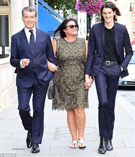 Just A Lovely Photo Of Pierce Brosnan With His Wife And Tall Son