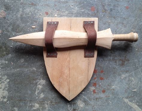 The guards provide extra reassurance, one retail executive told reuters, while another told usa today that they provide peace of mind. Handmade Toy Sword And Shield by Riftsawn Carpentry | CustomMade.com