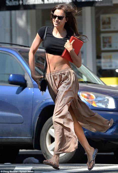 Irina Shayk Shows Off Her Toned Tummy In Short Cropped Top As She Runs