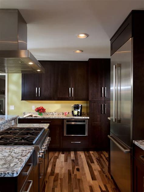 In this blog, we'll discuss the best kitchen flooring materials and the building materials that look great with them. Beautiful Hardwood Floors in Transitional Kitchen | HGTV