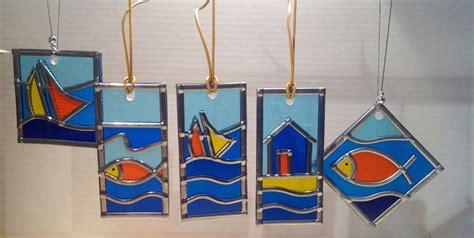 Where can i find free stained glass patterns? Seaside range of stained glass, beach hut, yacht, fish ...