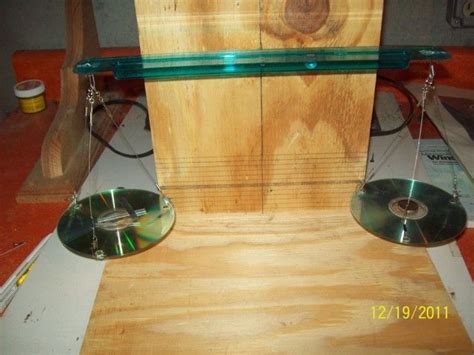 Also, replacing the wooden base plates with metal plates would increase the stability and robustness of the physical design. Weigh to Go: 9 DIY Balance Scales | Old cds, Early years ...