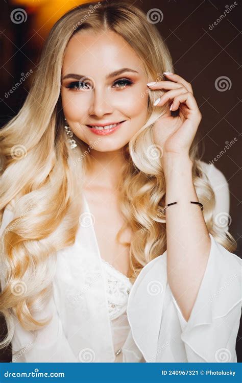 Beautiful Blondie Bride Smiling At Camera Posing At Bedroom Stock