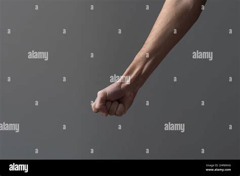 Mans Hand With Closed Fist Isolated On White Background High