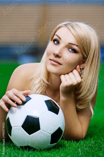 Sexy Football Soccer Fan Young Blonde With Ball Posing On Field