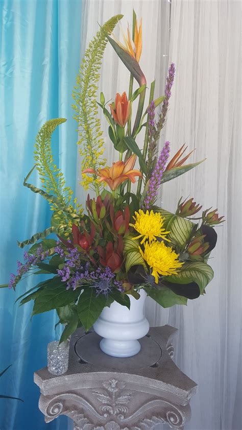 Maybe you would like to learn more about one of these? Tropical Urn in Phoenix, AZ | Arcadia Flowers & Gifts