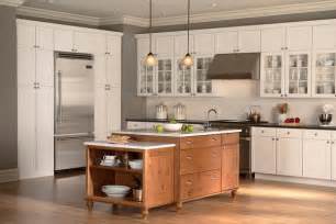 Traditional kitchen cabinets custom kitchen cabinets custom cabinetry antique glaze glaze paint solid doors moldings drawer fronts yellow and brown. Wolf Cabinetry | Cabinet Creations Plus