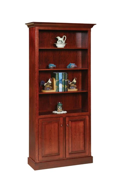 Media consoles with solid doors are useful for tucking away television cords and. Amish Shaker Style Bookcase with Doors | Amish Bookcases ...