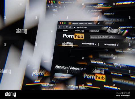 milan italy april 10 2021 pornhub company logo on laptop screen seen through an optical