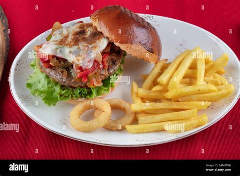 Burger Hamburger With Mushroom French Fries Ketchup Mustard And