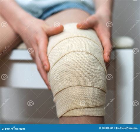 Child Knee With A Plaster For Wounds And Bruise Royalty Free Stock