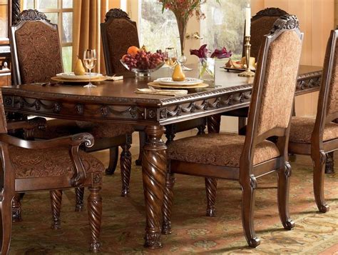Dine in grand traditional style with the north shore dining table from the north shore dining room collection by ashley furniture. North Shore Rectangular Extendable Dining Room Set ...