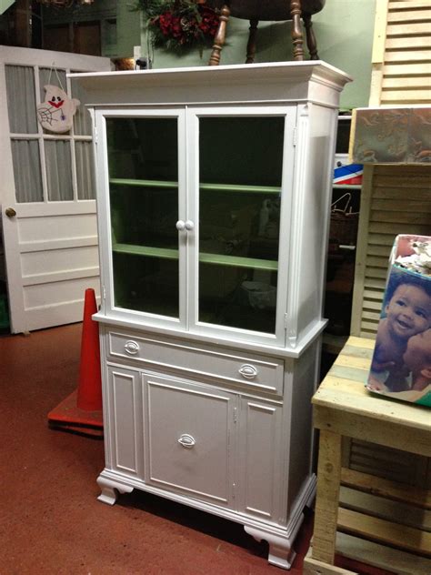 This china cabinet is perfect for tucking away extra dishes and glasses in your dining room or living room. Vintage mahogany china cabinet with modern makeover!!