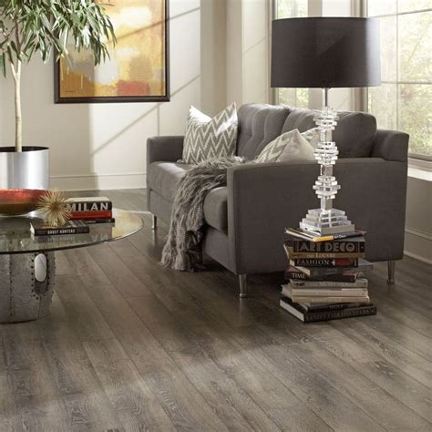 Manufactured by egger laminate flooring, light dunino oak is a modern light laminate floor in a tough 12mm laminate floor plank. Style Selections: Park Lodge Oak Flooring (Lowes) $1.49/sq ...