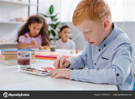 Selective Focus Multiethnic Kids Paint Brushes Drawing Pictures
