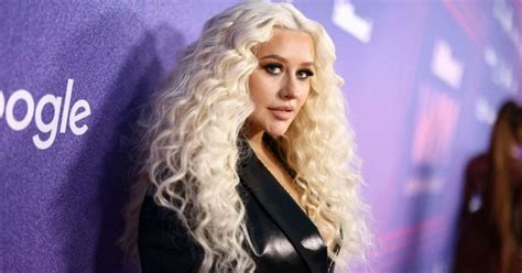 christina aguilera candidly talks about rarely seen son max says they share clothes from her