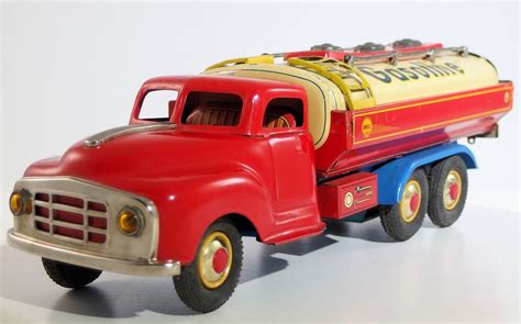 From classic car designs to the latest in race car styles, they'll love revving up their engines and making these cars scream across the kitchen floor! Rare-1950s-Marusan-Tin-Litho-Shell-Gasoline-Truck | Tin ...