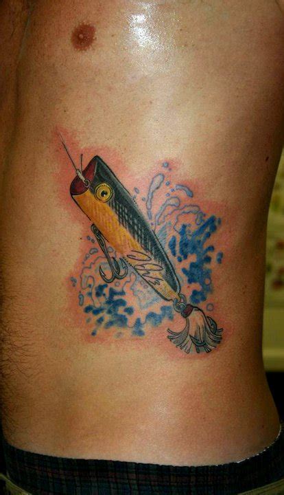 Tattoo designs run in the millions when it comes to options, but you always want to find a tattoo that represents who you are as a person to the fullest. fishing lure tattoo by twyliteskyz on DeviantArt