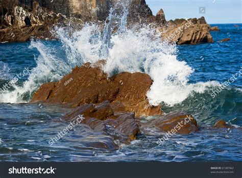 Waves Crashing Over Rocks Stock Photo 61387462 Shutterstock