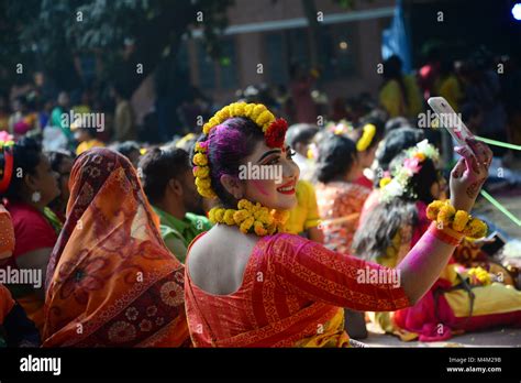 Bangladeshi Women Wearing Traditional Saris And Ornate Jewellery Take