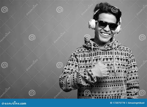 Portrait Of Young Asian Man Listening To Music Stock Photo Image Of
