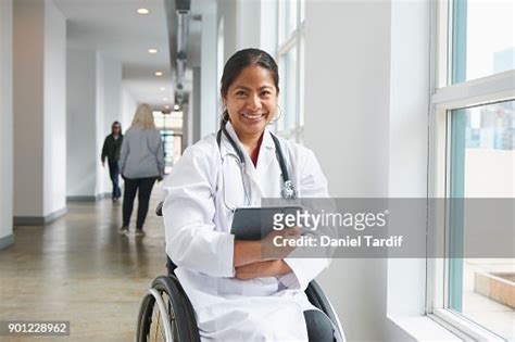 Smiling Doctor With Disability High Res Stock Photo Getty Images