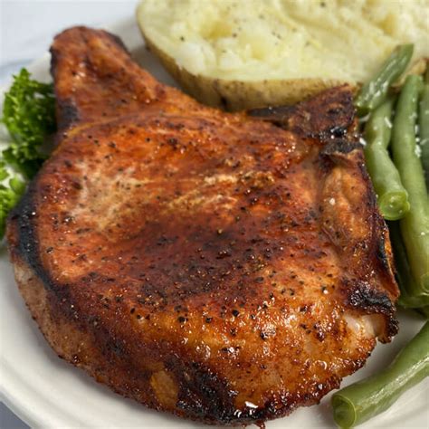 An easy recipe for a juicy oven baked boneless pork roast with a delightfully crispy skin. Oven Baked Bone-In Pork Chops - RecipeTeacher