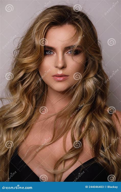Gorgeous Woman With A Beautiful Curly Hair And Professional Makeup Stock Image Image Of