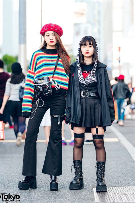 harajuku girls sporting different dark japanese streetwear styles while out and about one