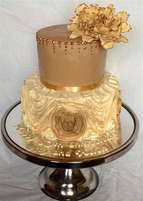 Planning your wedding cake and deciding on a design is an important step in your wedding preparation. Golden Wedding Anniversary Cake - CakeCentral.com