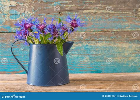 Bouquet Of Blue Cornflowers In Blue Jug Stock Image Image Of Wooden