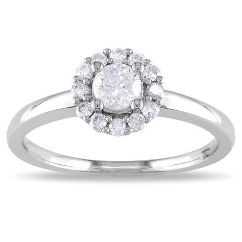 When we say cheap engagement rings, we don't mean low quality—we mean affordable and sustainable. Precious Halo Cheap Engagement Ring 0.33 Carat Round Cut ...