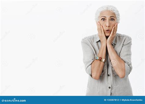 Portrait Of Stunned And Shocked Worried Old Lady With White Hair