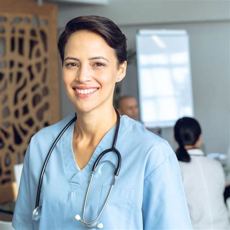 Happy Female Caucasian Nurse Looking At Camera In Jknp35f Healthy