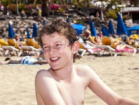 Teen Boy Sits At The Beach Stock Photo Image Of Spain 37286404