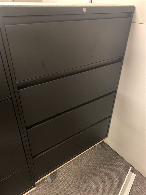 Lateral file cabinets are a great way to organize office files while conserving space. 4 Drawer Lateral Filing Cabinet Steelcase 900 Series Black